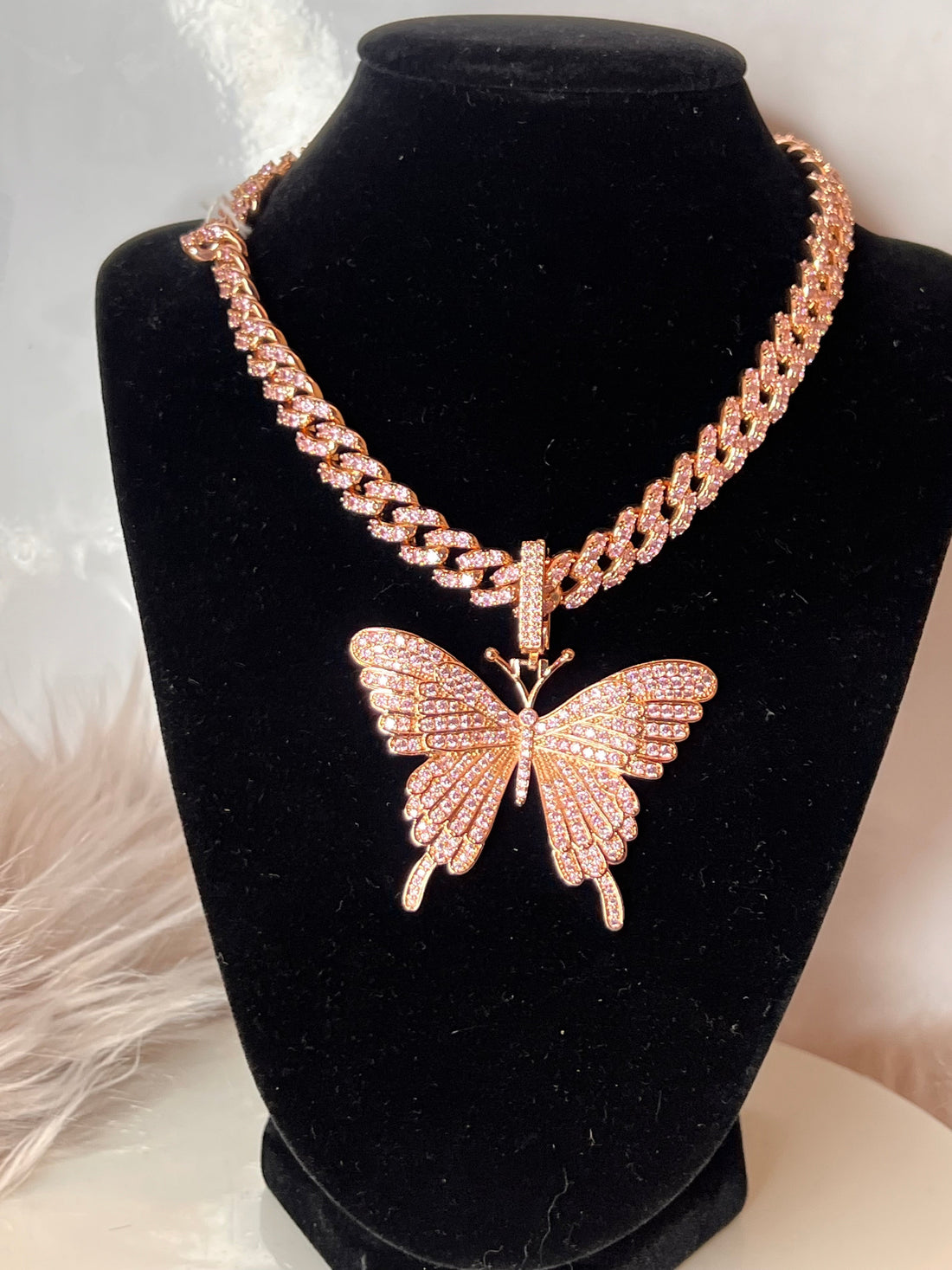 Pink Cuban link with diamonds